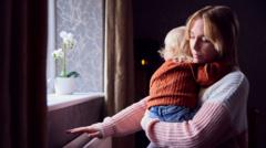 A family in London looking at their energy bill with concern, symbolizing financial strain.